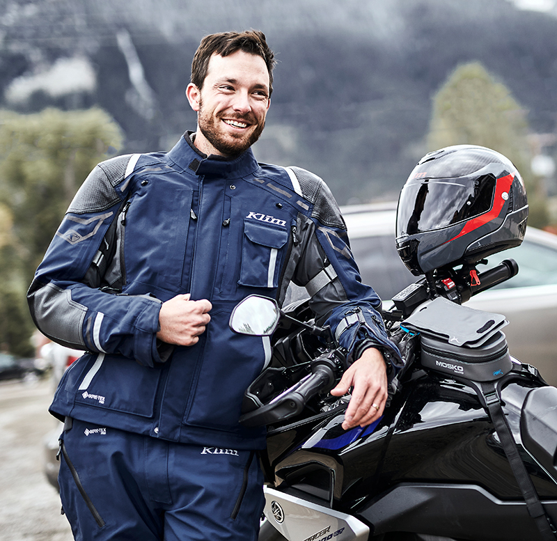 Guy wearing two-piece Klim Kodiak motorcycle suit